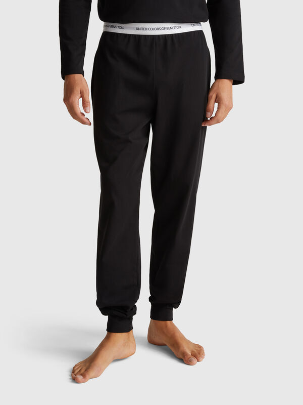 Trousers with elastic logo Men