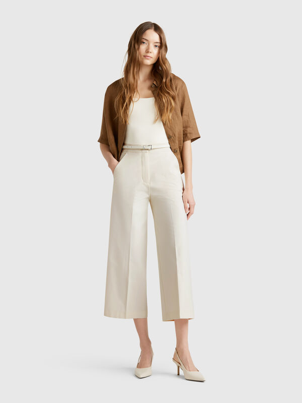 Cropped high-waisted trousers Women