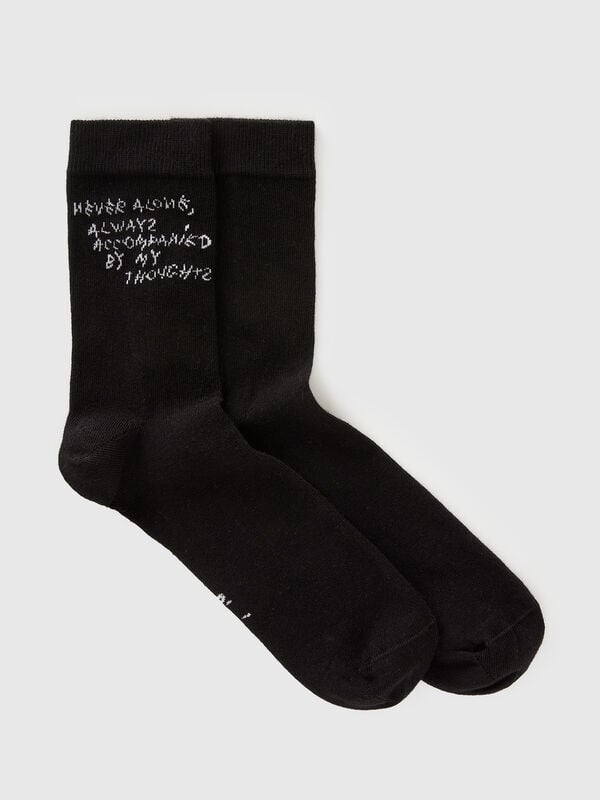 Black socks with Coco Capitán text
