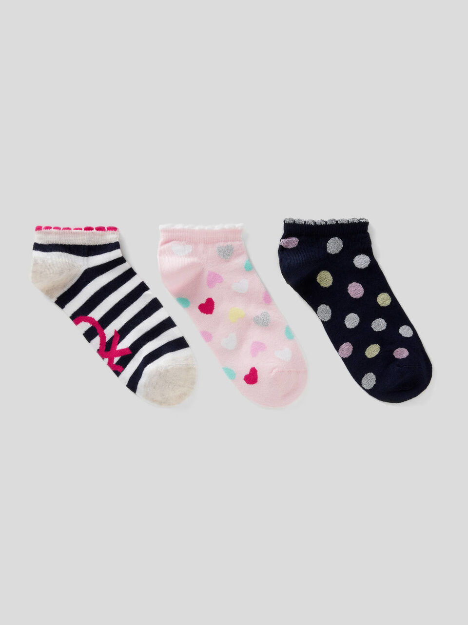 Three pairs of patterned socks image number 1