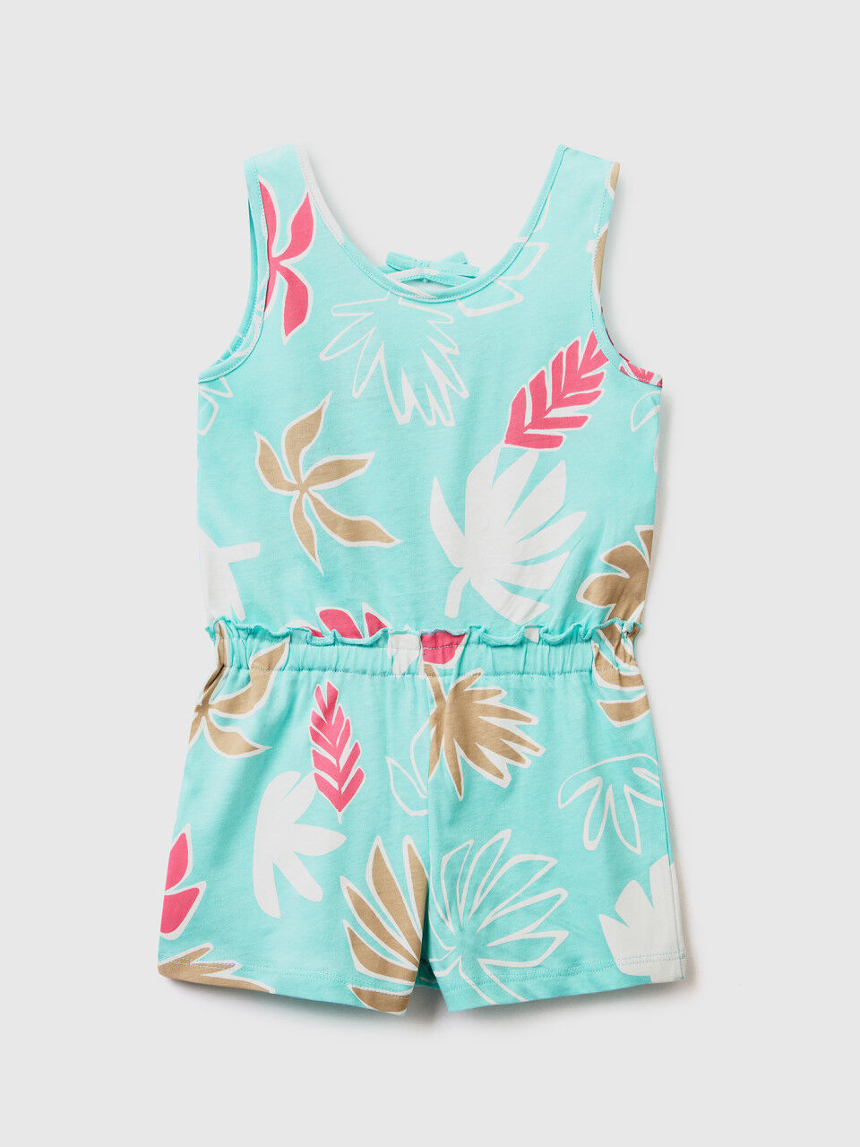 Short jumpsuit with tropical print